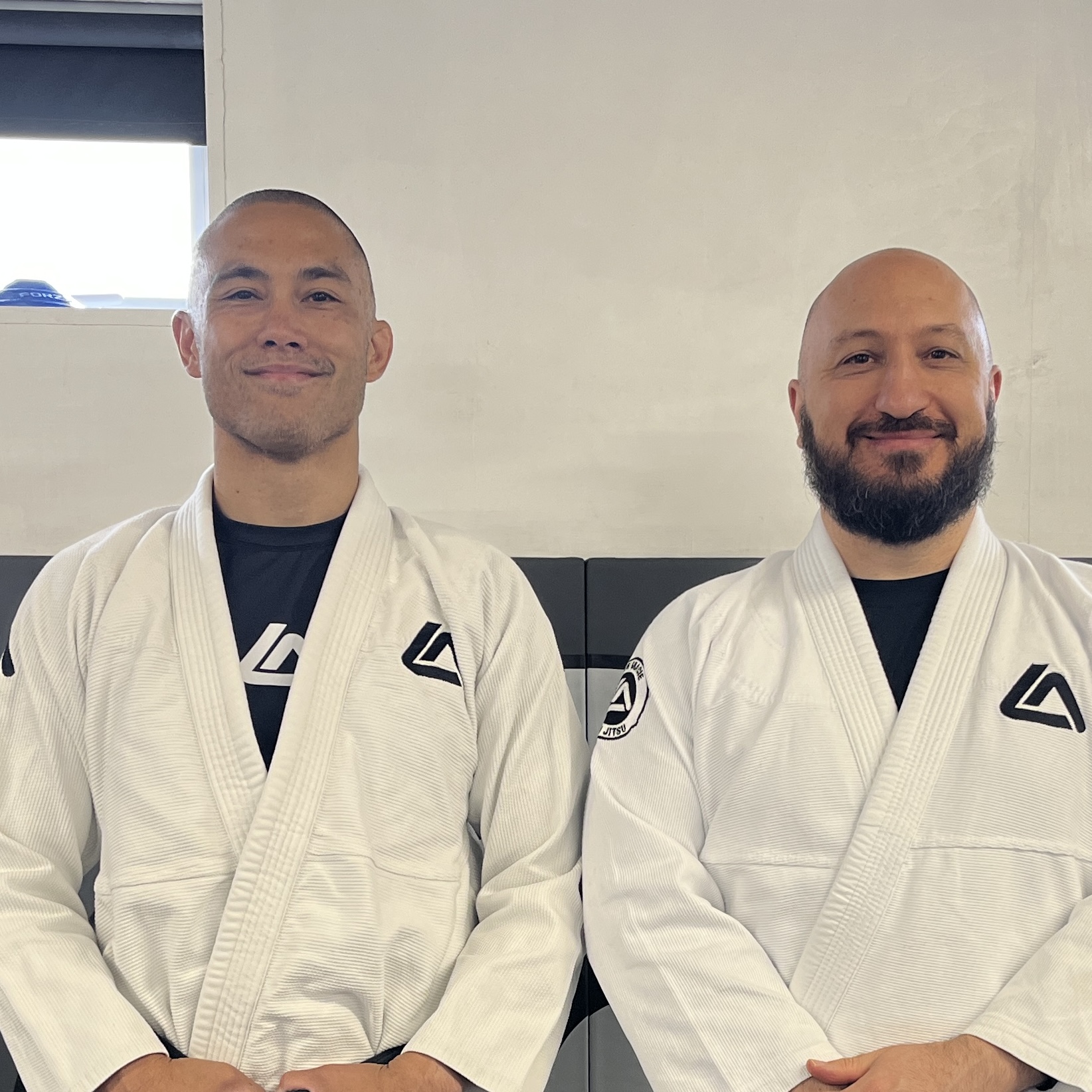 Olgun Tiltay learning Brazilian Jiu-Jitsu from Chris Ong [2nd Dan] BJJ Coach at Roger Gracie Academy